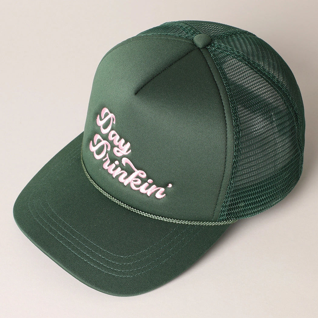 Front view of Day Drinkin’ embroidered hat in green and pink