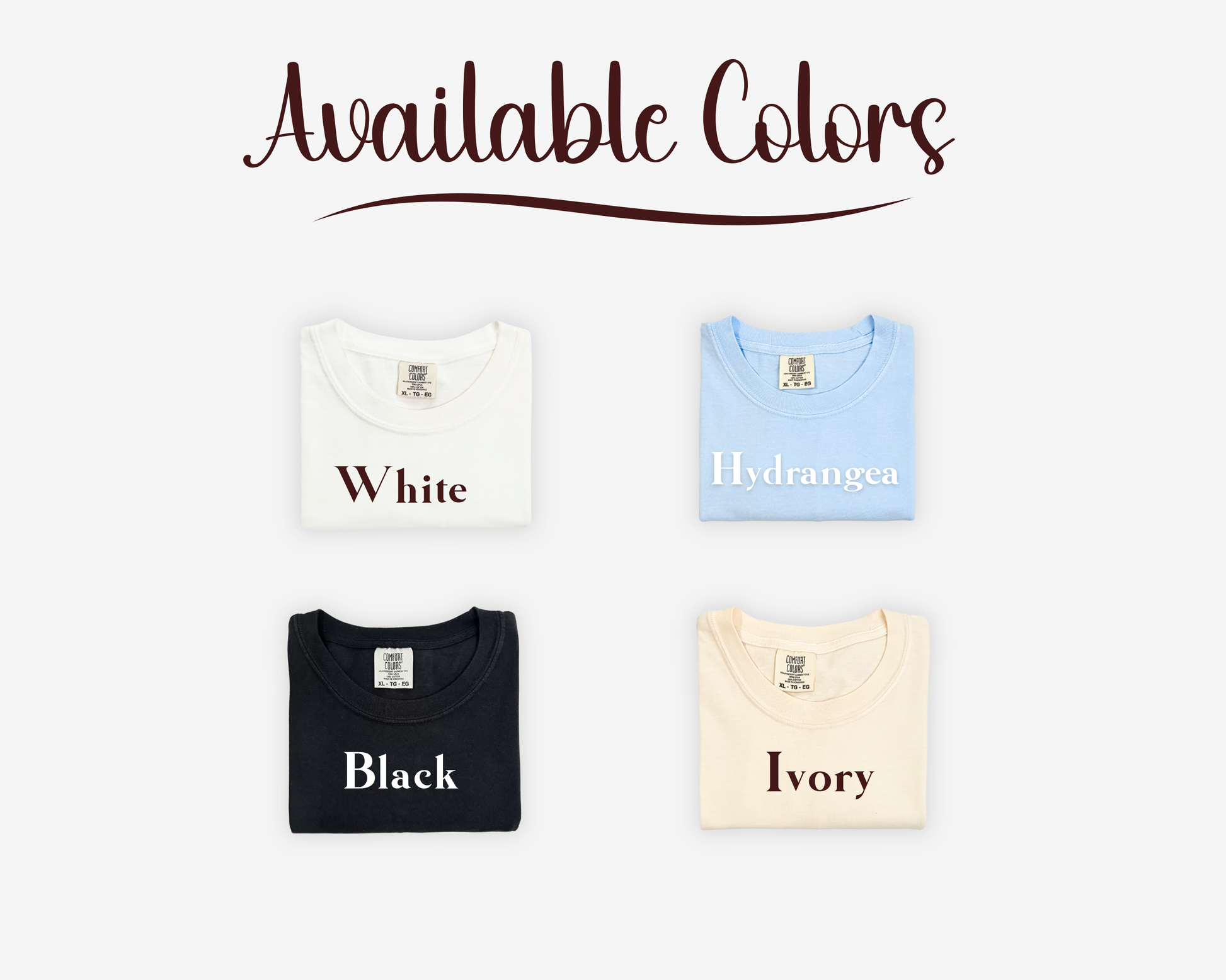 Four folded shirts in white, blue, black, and beige with color names printed on them against a white background.